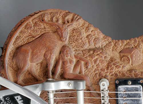 Carved guitar