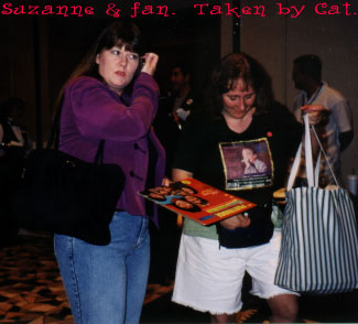 Suzanne and a fan at the Silent Auction.