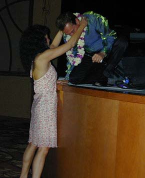 Joyce puts the lei on David