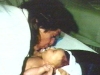 dc_kissing_newborn_beau