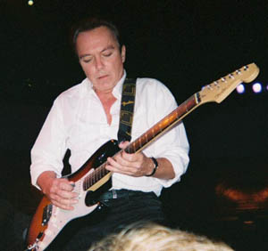 David playing his guitar