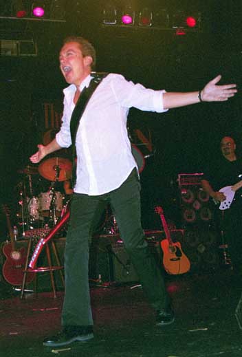 David arrives on stage