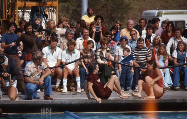 David gets out of the pool after the swimming race